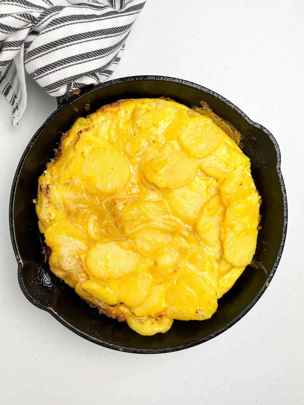 Baked Tortilla Española in an oven-proof skillet.