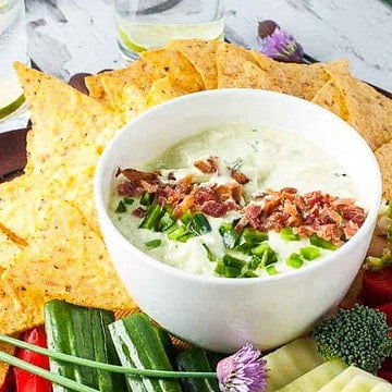 Bacon and Chive Jalapeño Dip surrounded by fresh veggies.