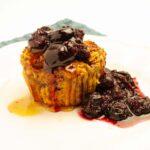 Cherry baked oatmeal cup with cherry sauce.