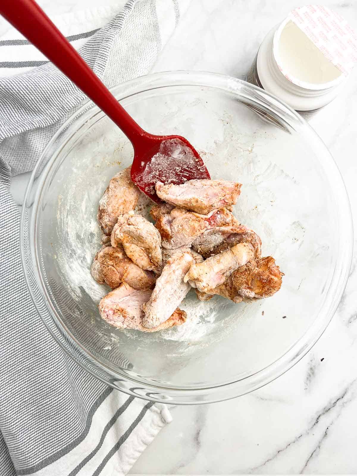 Chicken wings tossed with baking powder.