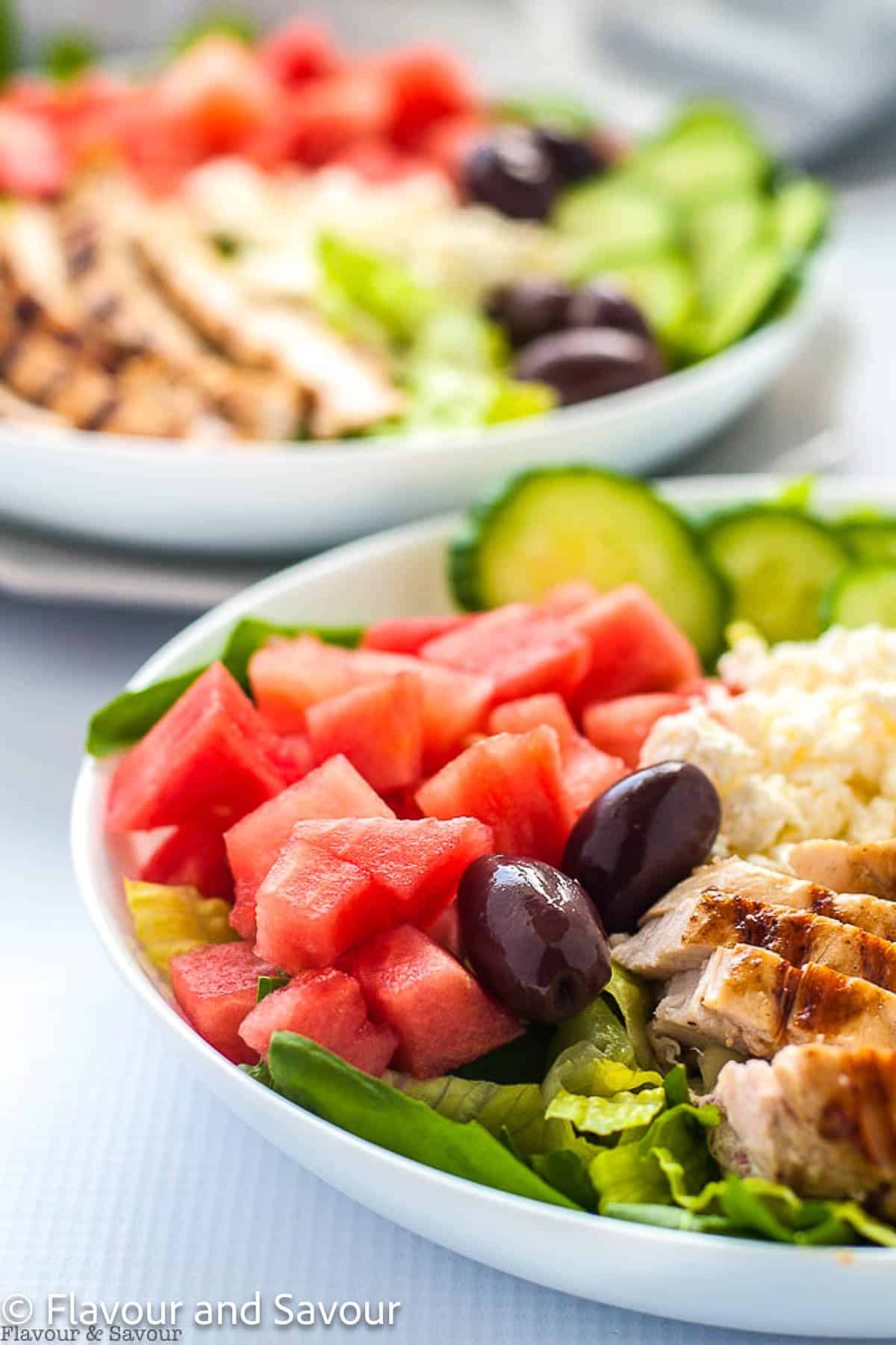 Greek chicken bowl with watermelon and feta, one of a collection of Greek chicken recipes.