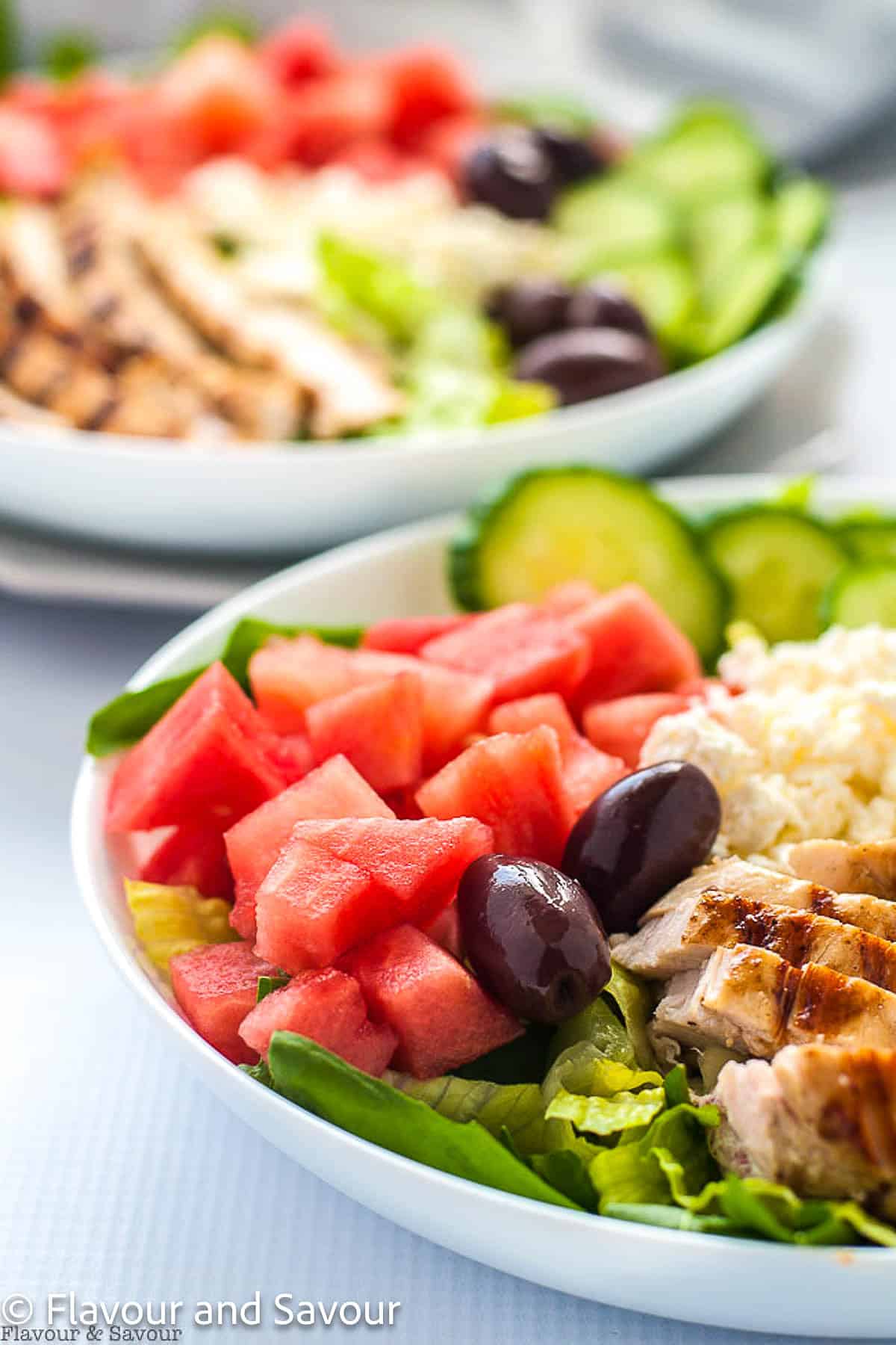 Greek chicken bowl with watermelon and feta, one of a collection of Greek chicken recipes.