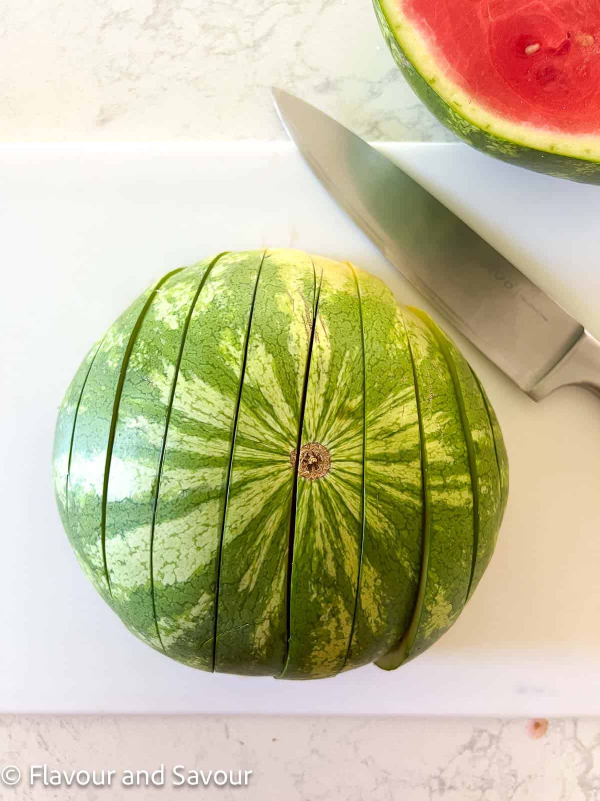 Half a watermelon, cut side down, sliced in ¾ inch slices.