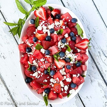 Strawberry watermelon salad with feta cheese and optional blueberries.
