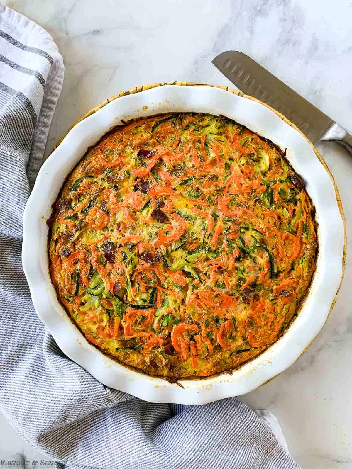 A baked zucchini carrot quiche.