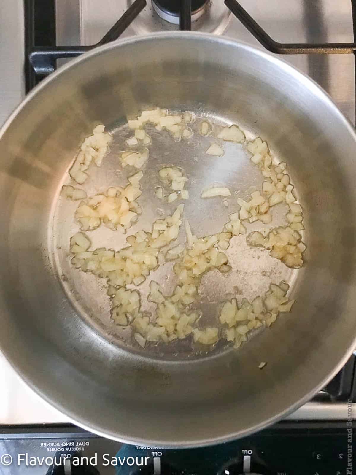 Sauteéing onions in a skillet.