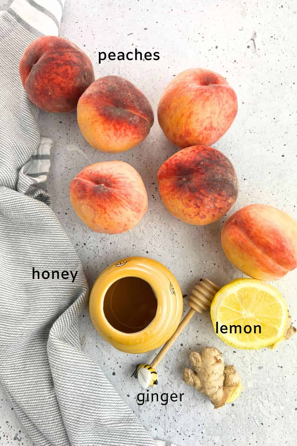 Labelled ingredients for peach ginger sorbet: peaches, honey, lemon and ginger.