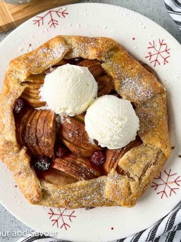An apple cranberry galette made with puff pastry.