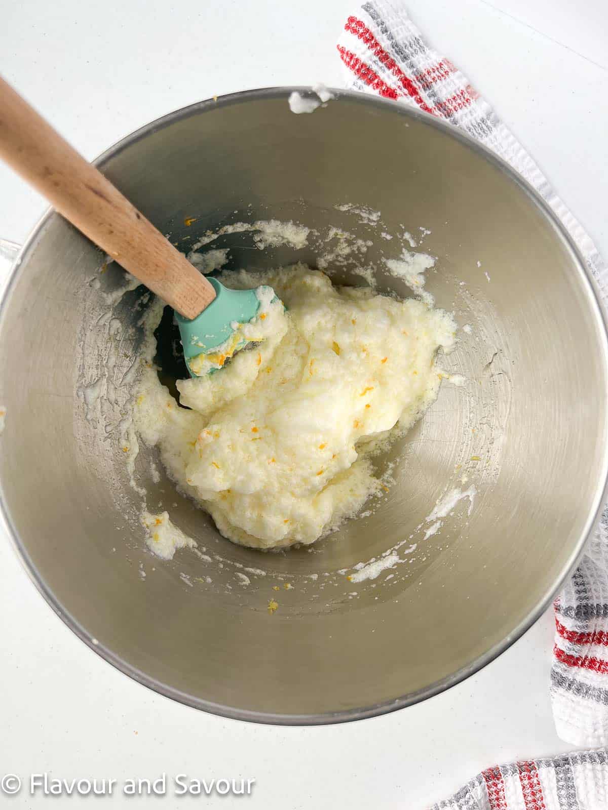 Combined whipped egg whites and almond flour batter in a bowl for Italian almond cookies.