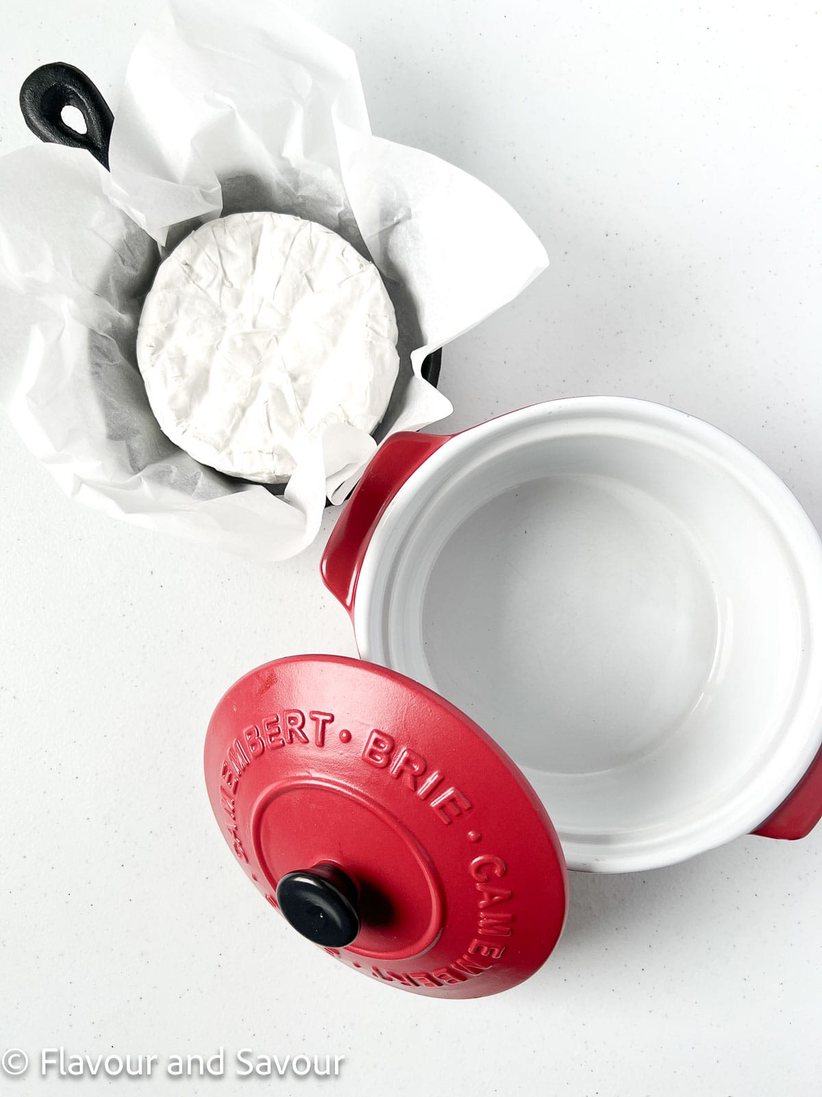 A mini cast iron pan or a Brie baker: two ways to bake Brie cheese.