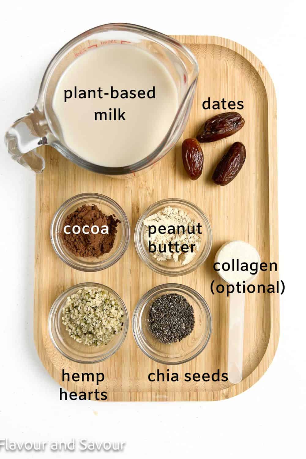 Labelled ingredients for chocolate peanut butter smoothie: plant-based milk, cocoa, peanut butter, hemp hearts, chia seeds, collagen powder (optional)