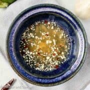 A bowl of Nuoc Cham, Vietnamese dipping sauce.