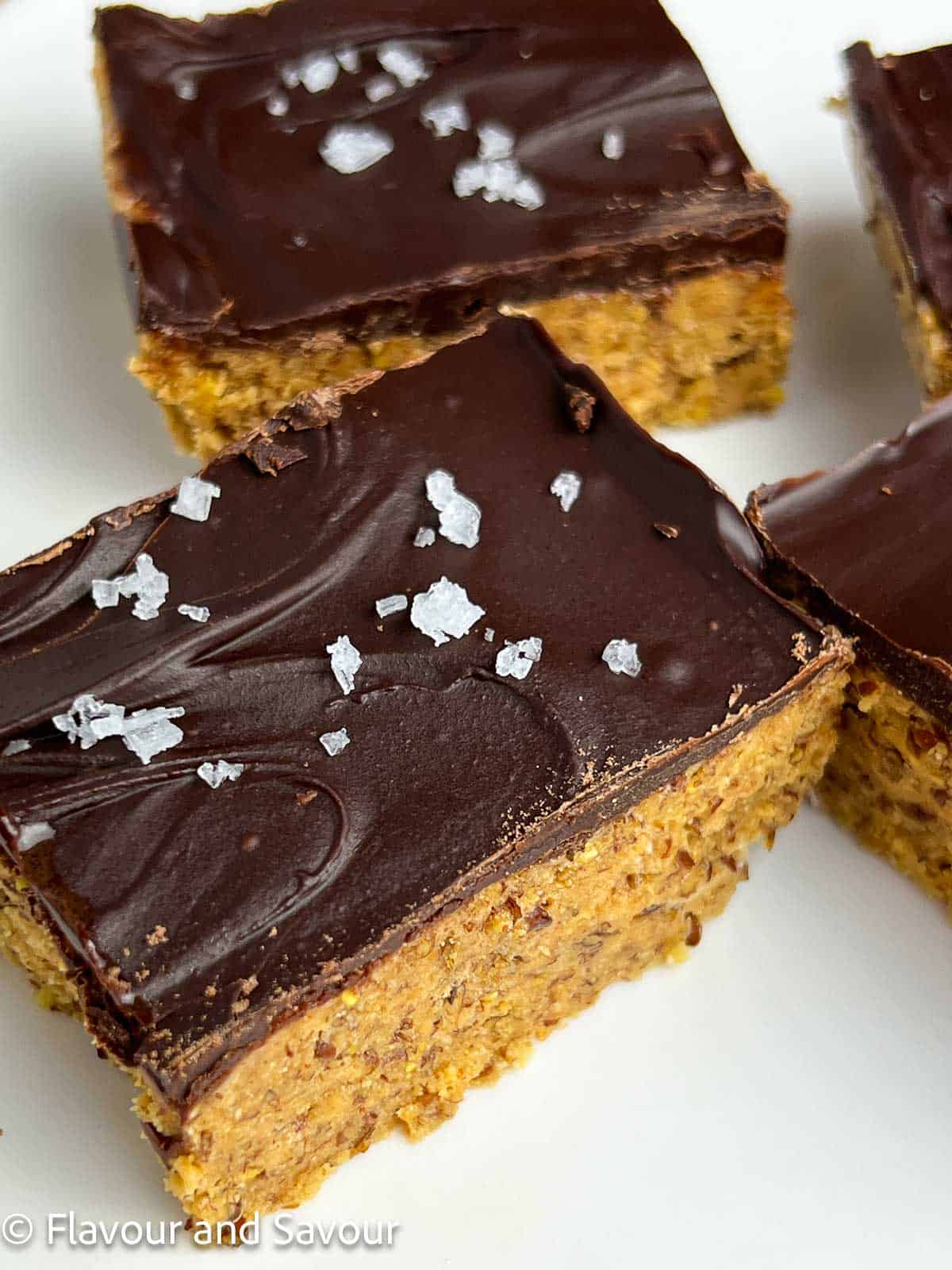 Peanut butter protein bars with collagen showing both the base and the chocolate topping.