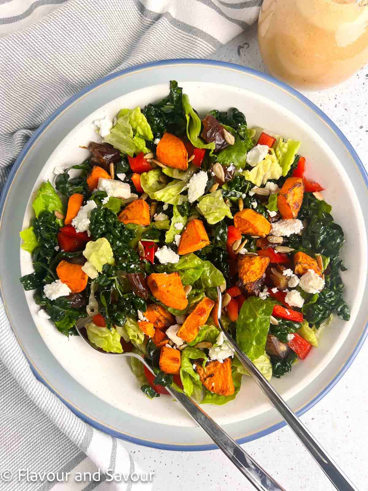 Roasted Sweet Potato Kale Salad with Feta and Dates in a bowl.