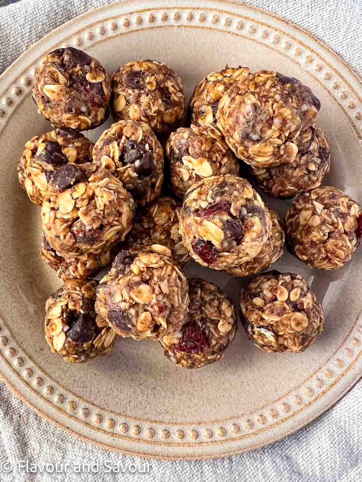 No-bake rolled oats energy balls on a plate.