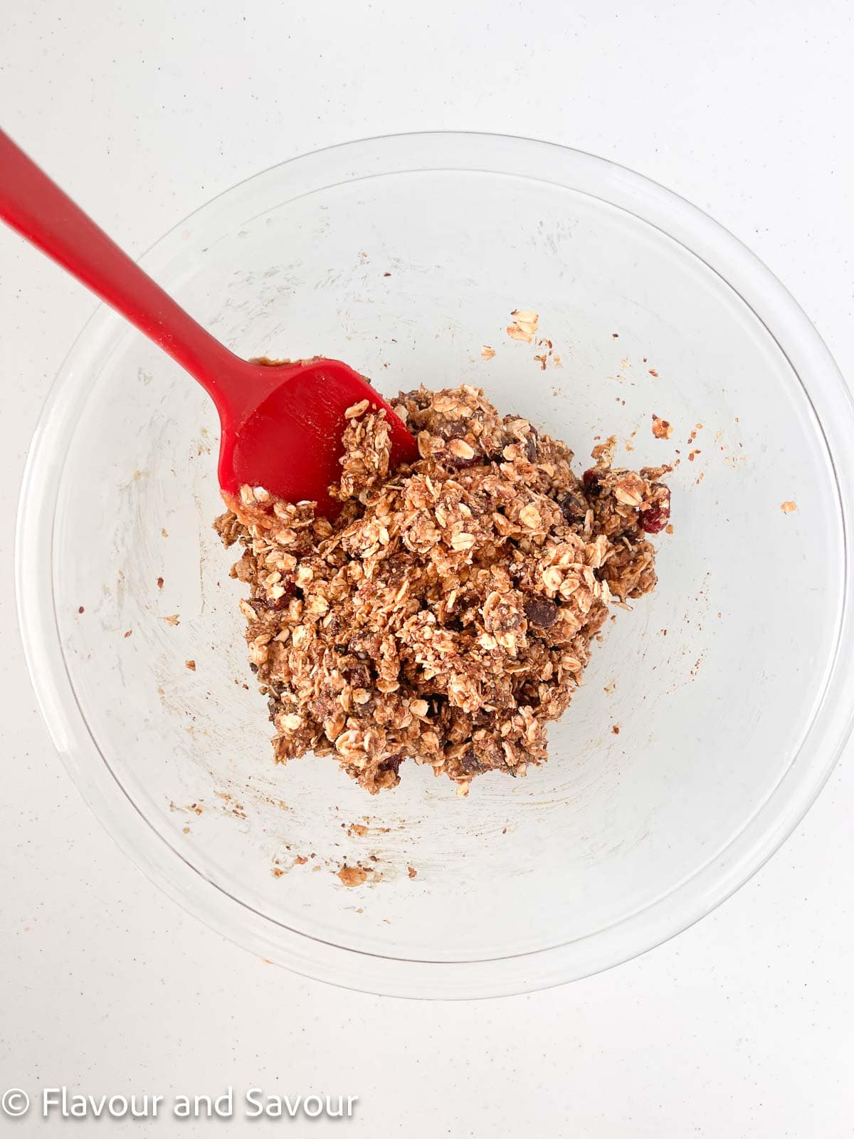 No-bake oatmeal energy balls mixture in a glass bowl.