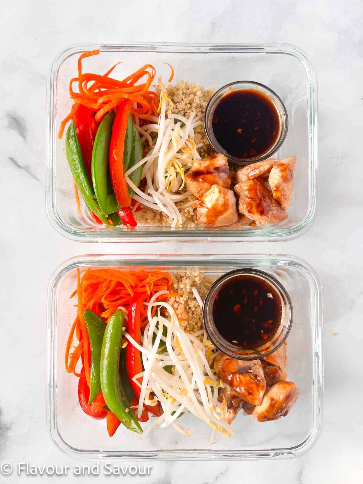Teriyaki chicken quinoa bowl in meal prep containers.