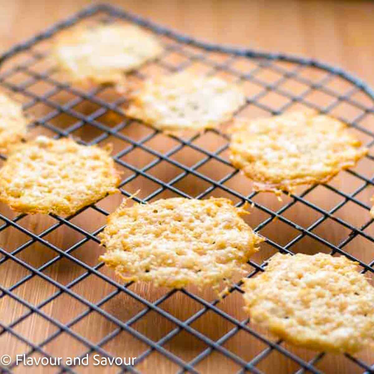 Parmesan crisps on a wire rack.